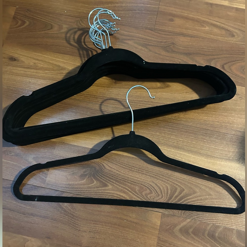 12 hangers black velvet/suede material (clothes stay on better!)